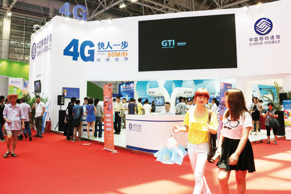 China Mobile's 4G promotional stand at a trade show in Fuzhou, Fujian province, on June 19. Provided to China Daily