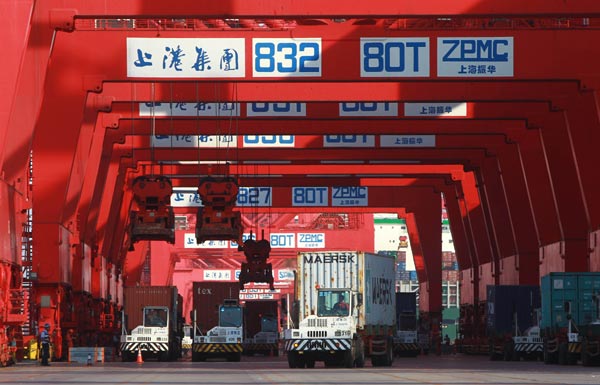 Container trucks in the Yangshan Port in Shanghai. The State Council on Wednesday approved Shanghai's free trade zone, which will cover 28 square kilometers and offer world-class transportation and communications facilities and a tax-free environment. Provided to China Daily