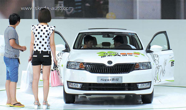 Women car buyers are on the rise in China. Their top preferences in a buying decision are safety, comfort and style, according to a recent survey. [Pan Yulong/Xinhua]