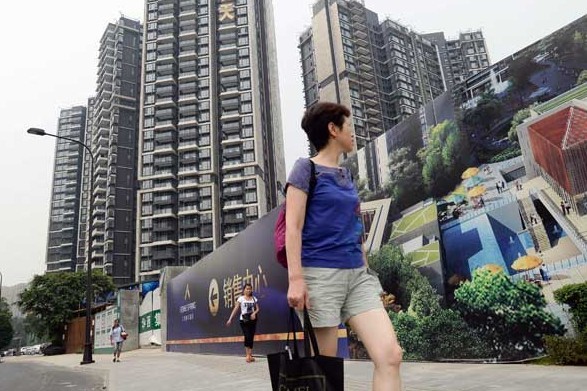 Seventy-one cities posted month-on-month increases in new home prices in August among 100 cities on the mainland. The government plans to launch pilot property tax programs in more cities to cool the market. [LI QIAOQIAO/XINHUA]
