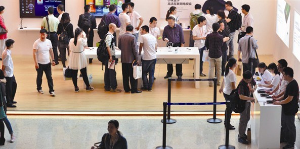 A Xiaomi Corp booth at the 2013 Global Mobile Internet Conference in Beijing. The company said its latest flagship mobile phone is the world's first smartphone running on Nvidia's Tegra 4 quad-core chipset and is the world's fastest smartphone. Provided to China Daily