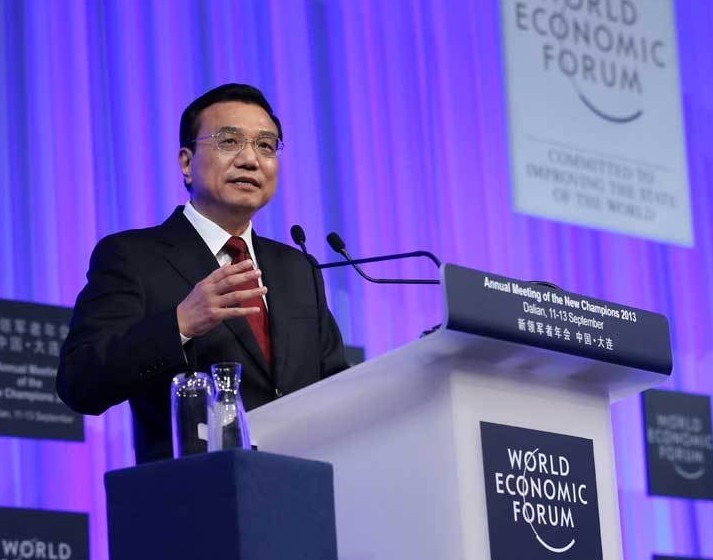 Chinese Premier Li Keqiang addresses the opening ceremony of the Annual Meeting of the New Champions 2013, also known as Summer Davos, in Dalian, northeast China's Liaoning Province, Sept. 11, 2013. The three-day Summer Davos opened here on Wednesday. (Xinhua/Pang Xinglei) 
