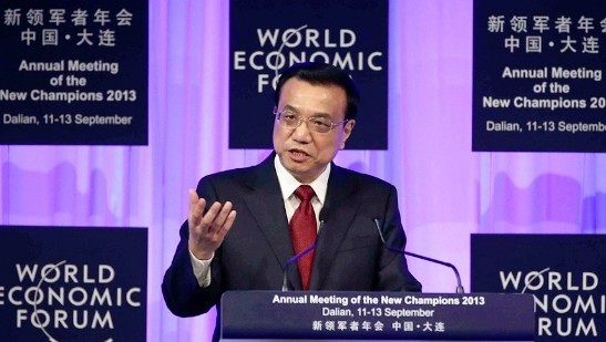 Premier Li Keqiang addresses opening ceremony of Annual Meeting of New Champions 2013, also known as Summer Davos, in Dalian, Sept. 11, 2013.(Xinhua)