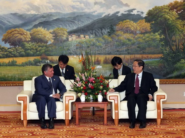 Yu Zhengsheng (R), chairman of the National Committee of the Chinese People's Political Consultative Conference, meets King Abdullah II Bin Al-Hussein of Jordan on the sidelines of the first China-Arab States Expo convened in Yinchuan, Ningxia Hui Autonomous Region, September 15. [Photo/Xinhua]