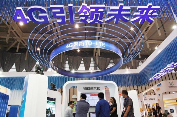 A China Mobile Ltd stand at an international software and information services expo in Nanjing, Jiangsu province. The country is expected to have 1.2 billion 3G/LTE users by 2020. Liu Jianhua/for China Daily