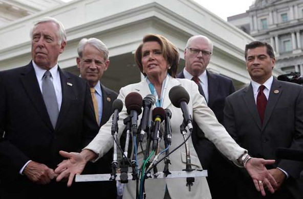 Minority Leader of the House Nancy Pelosi speaks to the media after a meeting with US President Barack Obama in the White House in Washington on Tuesday. [Yuri Gripas / Reuters]