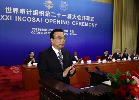 Chinese Premier Li Keqiang addresses the opening ceremony of the 21st International Congress of Supreme Audit Institutions (XXI INCOSAI) in Beijing, capital of China, Oct. 22, 2013. (Xinhua/Pang Xinglei)