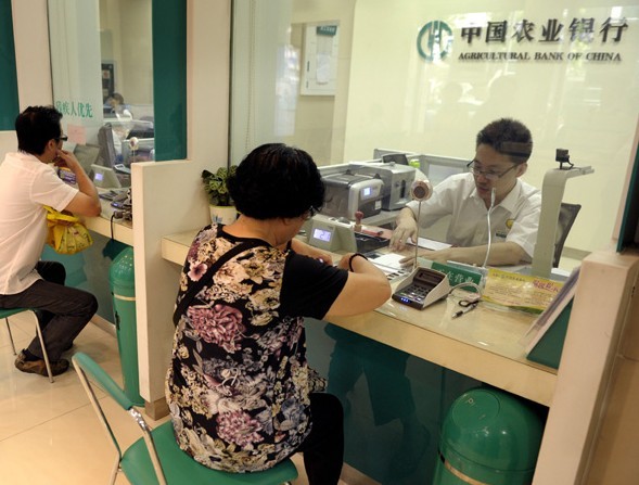 An Agricultural Bank of China Ltd outlet in Nanjing. ABC had the highest NPL ratio among the nation's 17 publicly traded lenders, according to first-half earnings reports on the China Banking Regulatory Commission's website. Provided to China Daily  