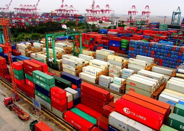 Containers are piled up at Waigaoqiao Port in the Shanghai Free Trade Zone on Friday. Chen Fei / Xinhua