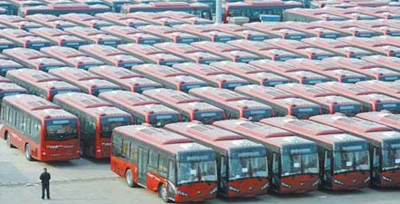 Buses are ready for export at a port in Lianyungang, Jiangsu province. In the first three quarters of 2013, trade between China and Portuguese-speaking countries reached $98.5 billion. Geng Yuhe / for China Daily
