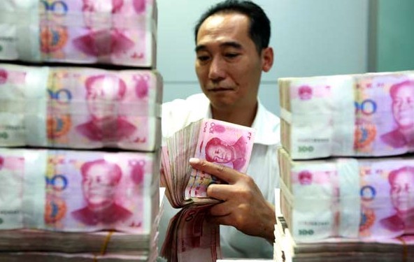 China's total social financing aggregate, a broad measure of liquidity in the economy, was 856.4 billion yuan in October, compared with 1.4 trillion yuan the month before. [xie zhengyi / for china daily]  