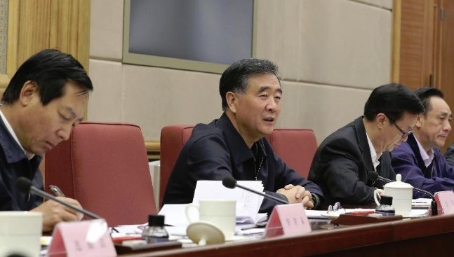 Chinese Vice Premier Wang Yang (2nd L) presides over a national meeting on combating intellectual property rights infringement and the manufacturing and sale of fake and shoddy goods, in Beijing, capital of China, Nov. 13, 2013. (Xinhua/Ding Lin)