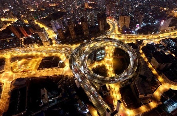Photo taken on Feb 24, 2013 shows the aerial view of the approach of the Nanpu Bridge in Shanghai, East China. [Photo/Xinhua]