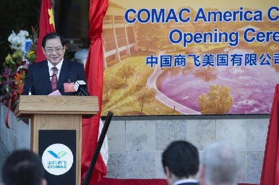 Jin Zhuanglong, president of Commercial Aircraft Corporation of China Ltd. (COMAC), speaks at the unveiling ceremony of COMAC American corporation in New Port, Orange County of California, the United States, on Nov. 24, 2013. (Xinhua/Yang Lei) 