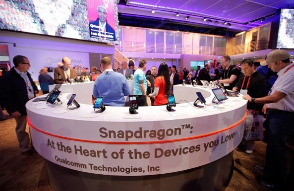 Qualcomm Inc's booth at the International Consumer Electronics Show in Las Vegas. Qualcomm reported $12.3 billion in revenue from China in the year ended Sept 30, which was equal to 49 percent of its total revenue. Provided to China Daily  