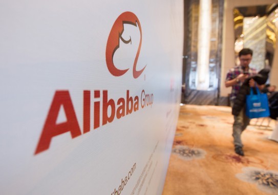 A banner shows the logo of Alibaba Group.[File photo / Provided to China Daily] 