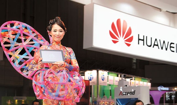 A model displays Huawei Technologies Co Ltds Ascend tablet at a consumer electronics show in Chiba, Japan. The company started to explore the overseas market about a decade ago and now has 70,000 research and development staff globally. FENG WUYONG / XINHUA