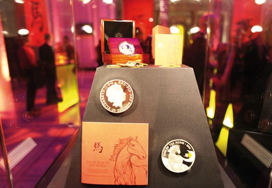 The Royal Mint last month launched coins commemorating the Chinese lunar year of the horse, designed by Wuon-Gean Ho, to attract Chinese collectors. Photos by Cecily Liu / China Daily  