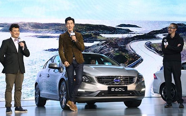 Television entertainers help introduce the new S60L in Beijing.  