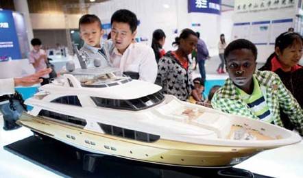 A model of a cruise liner impresses visitors to Dongguan Science and Technology Week in November. Manufacturers in the city are focusing more on innovation. Fang Guangming / for China Daily