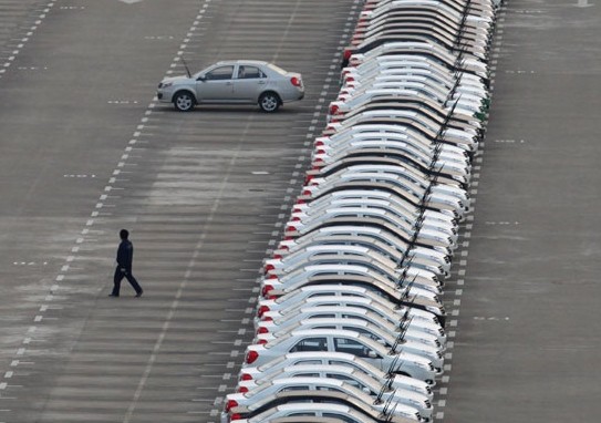 New vehicles ready for delivery at a Geely Holding Group Co Ltd plant in Taizhou, Zhejiang province. Pan Kanjun / For China Daily   