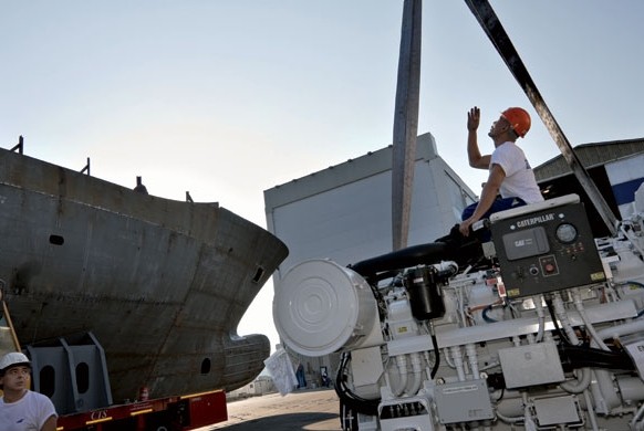 Employees of Italian luxury yacht maker CRN SpA at work. Provided to China Daily   