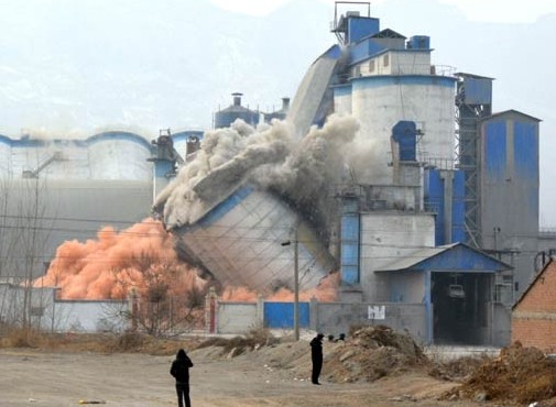 A cement plant in Shijiazhuang, Hebei province, is demolished amid the province's move to reduce its overcapacity and curb air pollution. China is paying more attention to the quality of its economic growth. Wang Ge/China Daily  