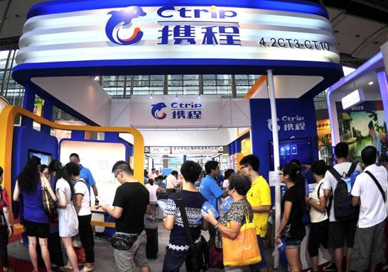 Citizens consult at the Ctrip.com booth in the China International Tourism Industry Expo in Guangzhou, Guangdong province, in August 2013. The online travel operator reached 5.4 billion yuan ($882 million) in net revenue in 2013, increasing 30 percent year-on-year. Provided to China Daily   