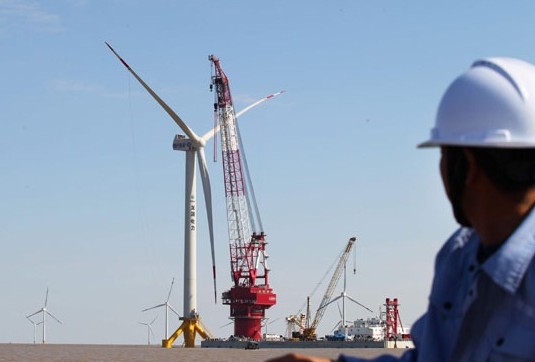 The world's largest offshore wind station under construction in Rudong, Jiangsu province. China aims to expand its installed capacity for wind power this year, with an emphasis on offshore facilities. Xu Congjun / for China Daily