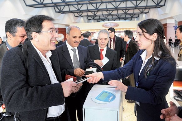 Passengers boarding a flight to Beijing in Algiers. Algeria began to operate direct flights to the Chinese capital in 2009. Yin Ke / Xinhua   