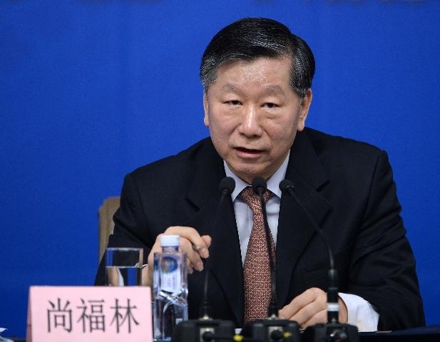 Shang Fulin, president of China Banking Regulatory Commission, speaks at a press conference for the second session of China's 12th National People's Congress (NPC) on financial reform in Beijing, capital of China, March 11, 2014. (Xinhua/Wang Peng)  