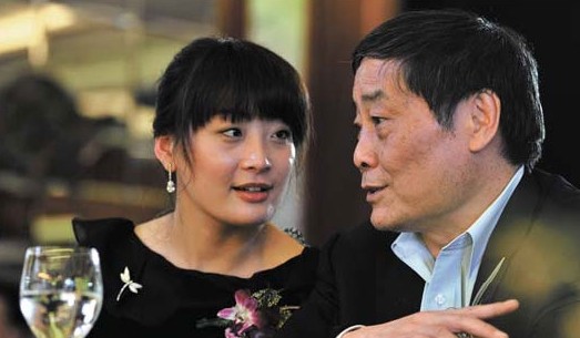 Kelly Zong, the daughter of Zong Qinghou, chairman of Hangzhou Wahaha Group Co Ltd and the richest man on the mainland, attends a ceremony with her father in Hangzhou, Zhejiang. Provided to China Daily   