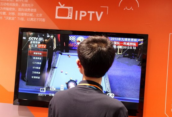 An IPTV booth at an international Internet exhibition in Beijing. The annual turnover of China's information technology and telecommunication industries is set to hit $602.3 billion by 2020. Provided to China Daily  