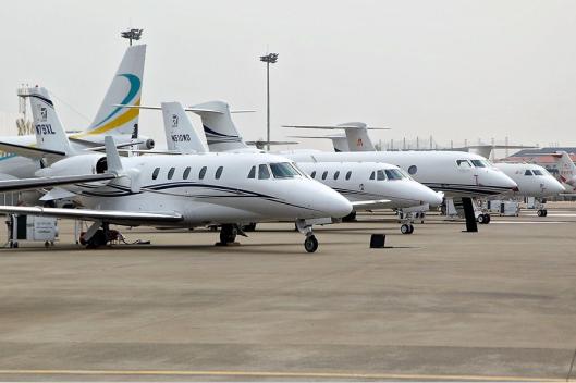 Business aircraft are displayed at the Shanghai Hawker Pacific Business Aviation Service Center during a preview of the Asian Business Aviation Conference and Exhibition on Monday. The three-day event opens on Tuesday. (Photo source: Shanghai Daily)