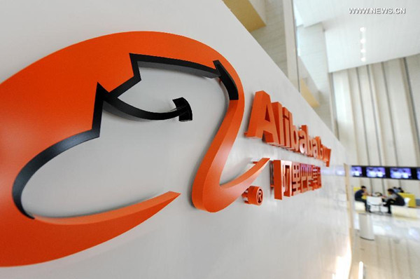 The logo of Alibaba Group is seen in Alibaba Group in Hangzhou, capital of east China's Zhejiang Province, March 25, 2014. [Photo/Xinhua]