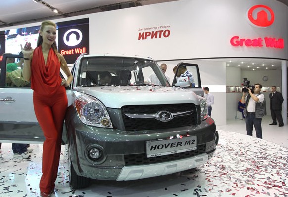 Cars made by Great Wall Motor Co Ltd are presented at an international expo in Moscow. The privately owned Chinese company plans to invest 3.2 billion yuan ($510 million) in building a car manufacturing plant in Russia, its largest export destination. Lu Jinbo / Xinhua