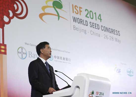 Chinese Vice Premier Wang Yang addresses the opening ceremony of the 2014 World Seed Congress in Beijing, capital of China, May 26, 2014. (Xinhua/Ding Lin)