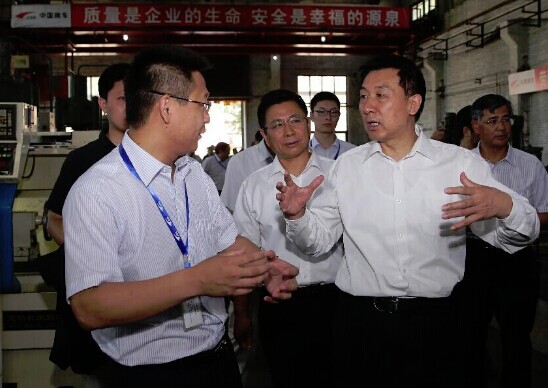 Chinese state councilor Wang Yong visits China South Locomotive and Rolling Stock Corporation Ltd. (CSR) in Beijing, capital of China, May 29, 2014. Wang made an inspection tour to some central enterprises in Beijing on May 27 and 29. (Xinhua/Liu Weibing)