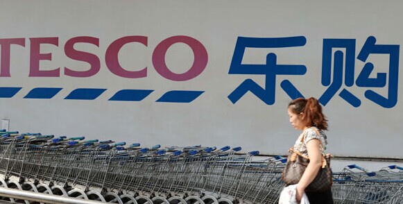 An outlet of Tesco in Shanghai.China Resources Enterprise Ltd announced on Thursday that the joint venture agreement it signed last year with Tesco Plc has been approved by the Chinese government. Lai Xinlin / For China Daily  