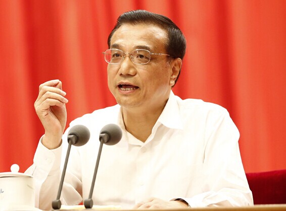Premier Li Keqiang addresses a conference of the Chinese Academy of Sciences and the Chinese Academy of Engineering in Beijing on Tuesday. [Feng Yongbin / China Daily]  