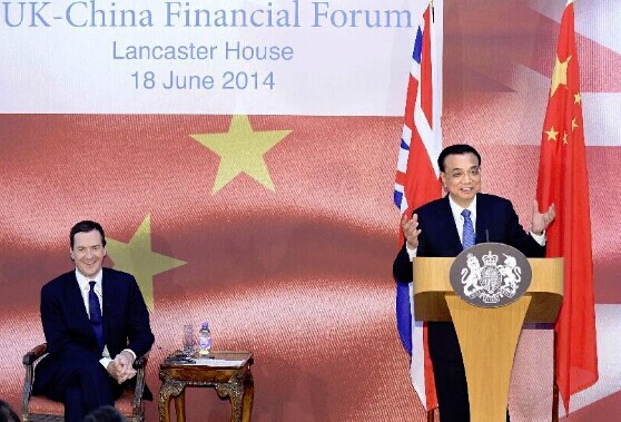 Chinese Premier Li Keqiang (R) and British Chancellor of the Exchequer George Osborne attend the UK-China Financial Forum in London, capital of Britain, June 18, 2014. (Xinhua/Li Tao)