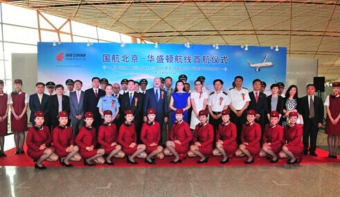 Staff members of Air China pose at the launch event of the new route between Beijing and Washington DC on June 10. Photo: Courtesy of Air China