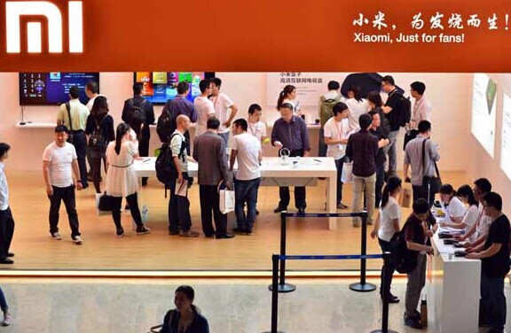 A Xiaomi Corp booth at the 2013 Global Mobile Internet Conference in Beijing. The company said its latest flagship mobile phone is the world's first smartphone running on Nvidia's Tegra 4 quad-core chipset and is the world's fastest smartphone. Provided to China Daily  