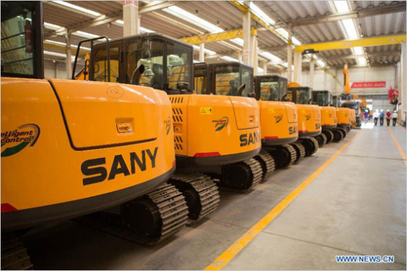 Photo taken on Feb. 6, 2014 shows machineshop trucks in a plant of Chinese multinational heavy machinery manufacturing company Sany in San Jose Dos Campos, Brazil. [File photo: Xinhua]
