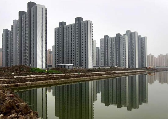 Photo taken on July 4, 2014 shows newly-built houses in East China's Shanghai. [Photo/Xinhua]  