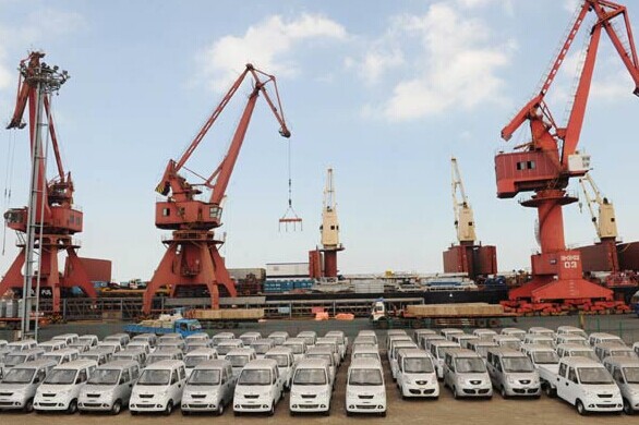 Utility vans for export at Lianyungang port in Jiangsu province. About 80 million vehicles will be sold in Latin America and Asia from 2013 to 2020. GENG YUHE/CHINA DAILY  