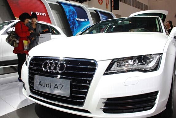 An Audi A7 is shown at an international auto exhibition in Hainai province. Major luxury car manufacturers are reducing the prices of their vehicles, parts and after-sales service under pressure from Chinese anti-trust regulator's monopoly concerns. SHIYAN/CHINA DAILY  