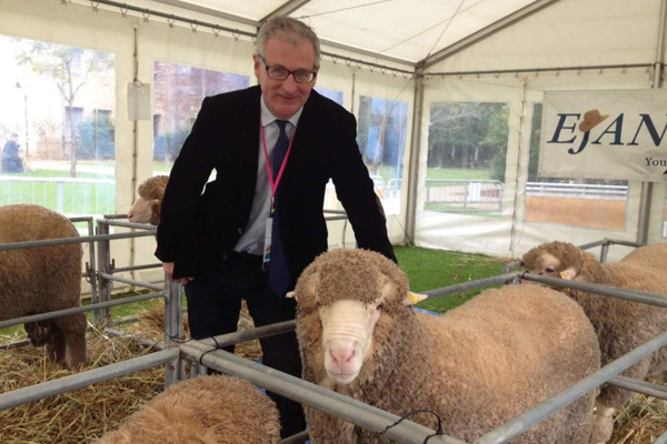 James Kynge, Editor of Emerging Markets at the Financial Times, with a woolly friend at the 2014 Sheep Updates at the University of Western Australia. (Olivia Garnett)