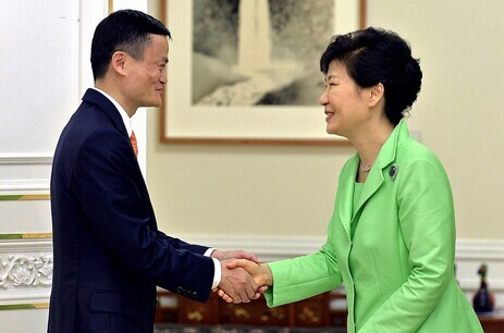 Ma Yun (left), founder and chairman of Chinese e-commerce giant Alibaba Group, greets South Korean President Park Geun-hye during their meeting in Seoul yesterday. — Xinhua
