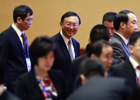 State Councilor Yang Jiechi (center) attends the opening ceremony of the Third Senior Officials' Meeting of the APEC 2014 in Beijing on Aug 20. [Provided to China Daily]  